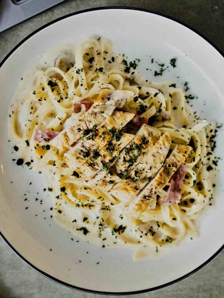 Slow Simmered Creamy Tuscan Chicken Alfredo