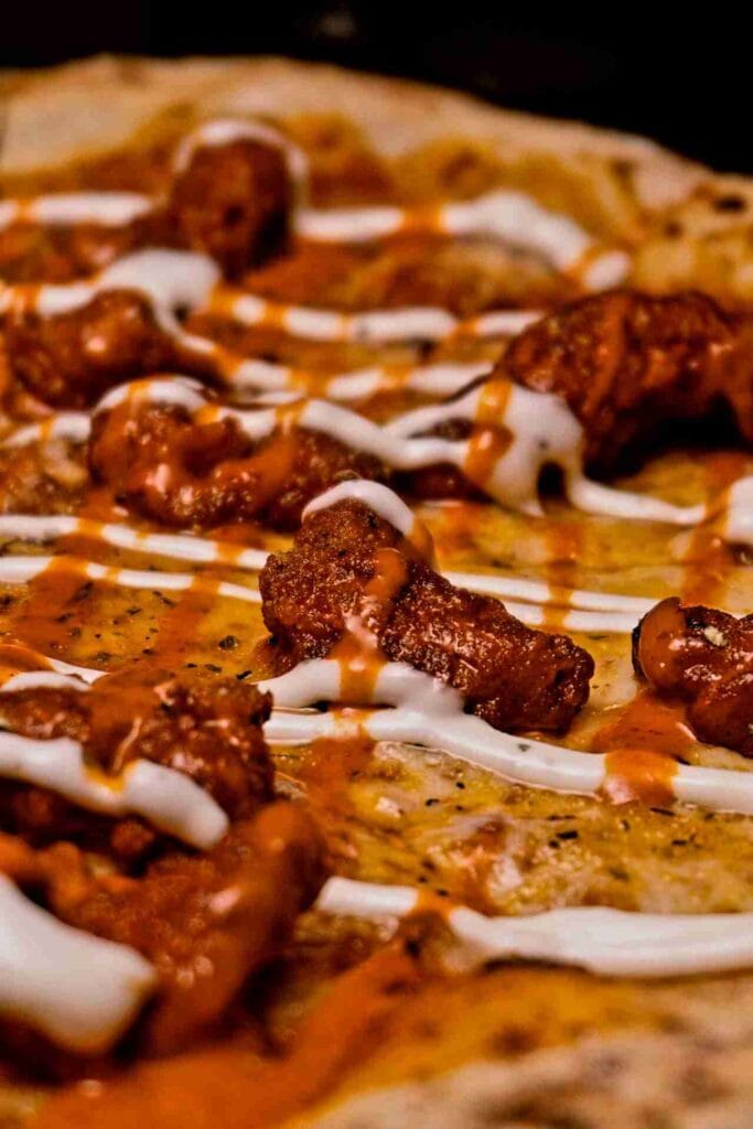 Drizzling Pizza Wings Sandwich